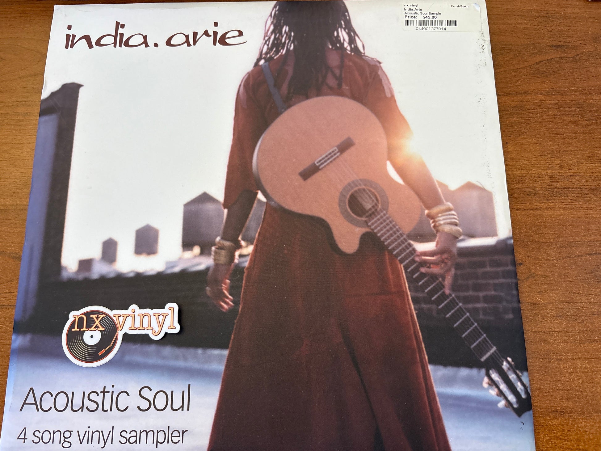Vinyl record cover with a person holding a guitar, featuring the artist 'India.Arie' and album title 'Acoustic Soul'.